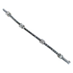 Schwarze Diamanten, weiße Diamanten, 14 Karat Weißgold-Tennisarmband