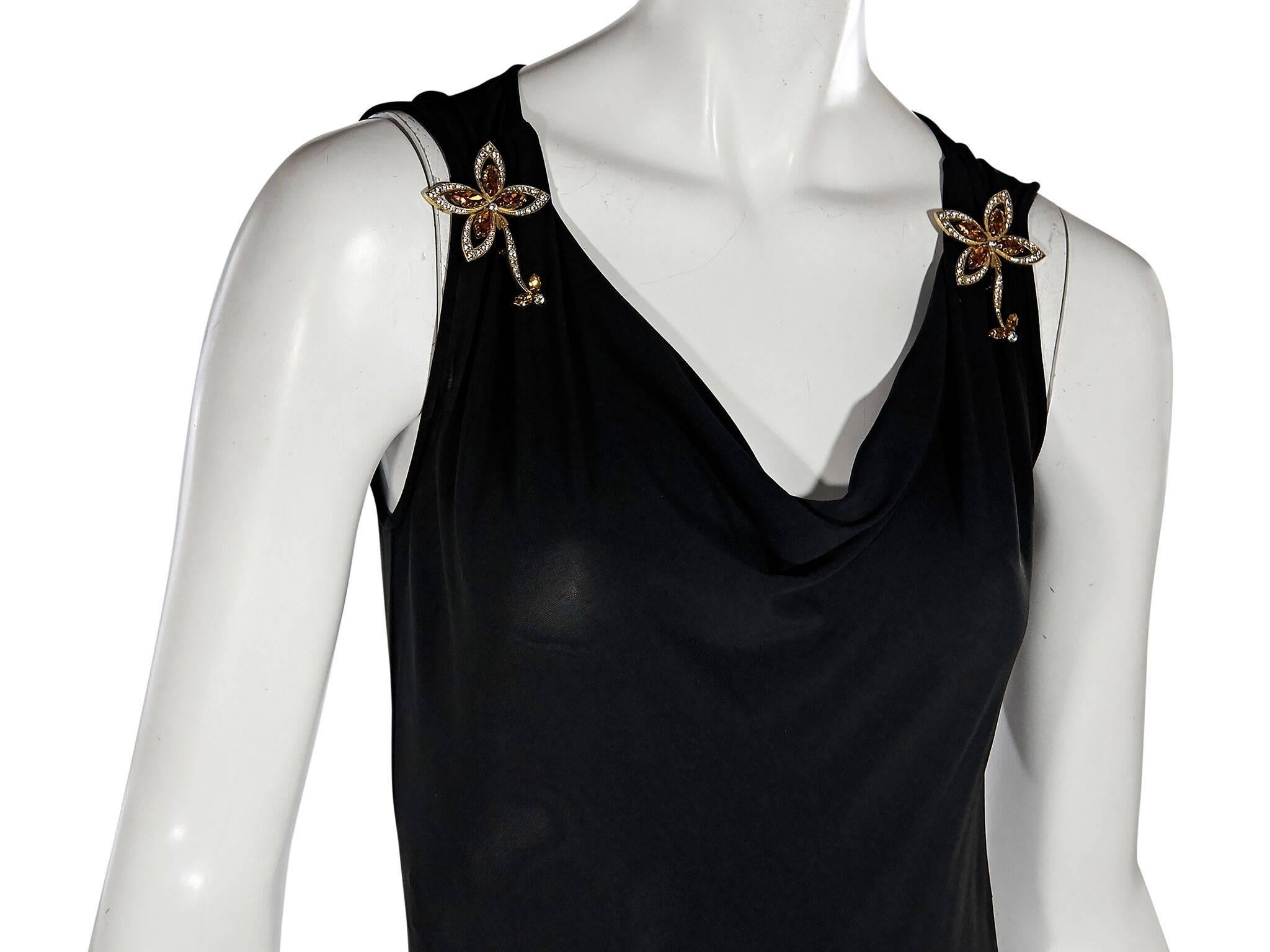 Product details:  Black knee-length dress by Dolce & Gabbana.  V-neck.  Sleeveless.  Goldtone brooches accent shoulder straps.  Concealed back zip closure.  34