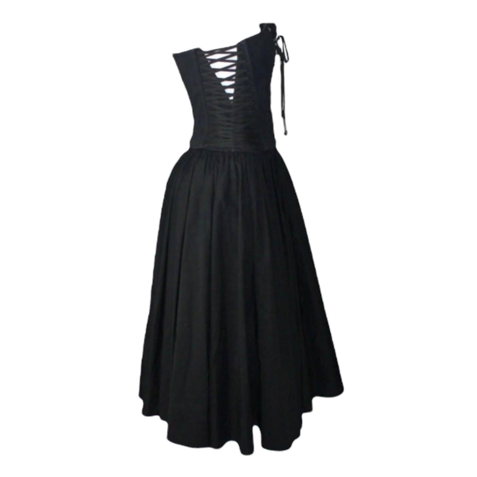 Timeless black dress by Dolce & Gabbana
Stunning corset part with lace up detail in front and on sides
Corset fully boned, can be adjusted with lace up for a perfect fit
Closes with hidden zip on side
Gathered skirt part
Lace up details
Bra not