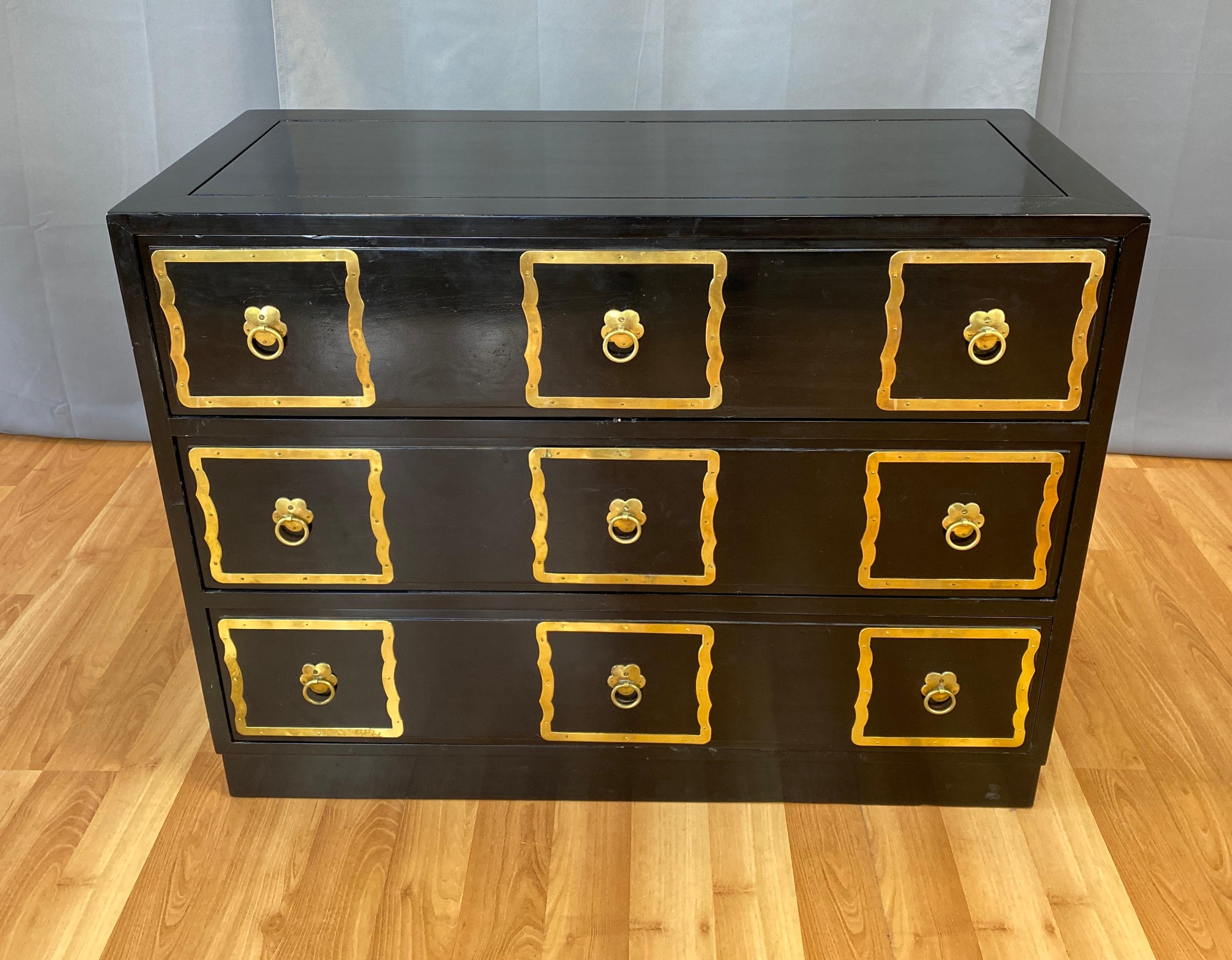 Offered here is a Dorothy Draper style Espana dresser in black. 
Has three good size drawers that are about 6 7/8 inches deep each. 
What's unique to this dresser, surrounding the handle pulls, unlike the carved design on the ones made by