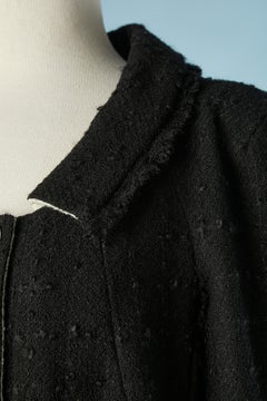 Black double-breasted diner jacket with branded buttons Chanel