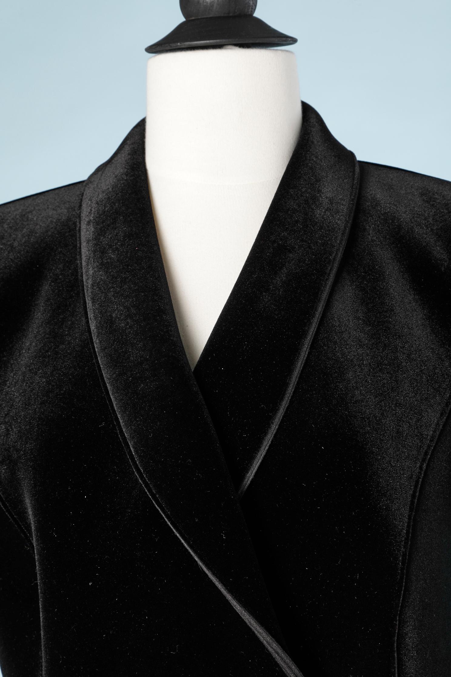 Black double-breasted technical velvet ( sort of neoprene velvet) evening jacket. 
No lining. 
SIZE L
