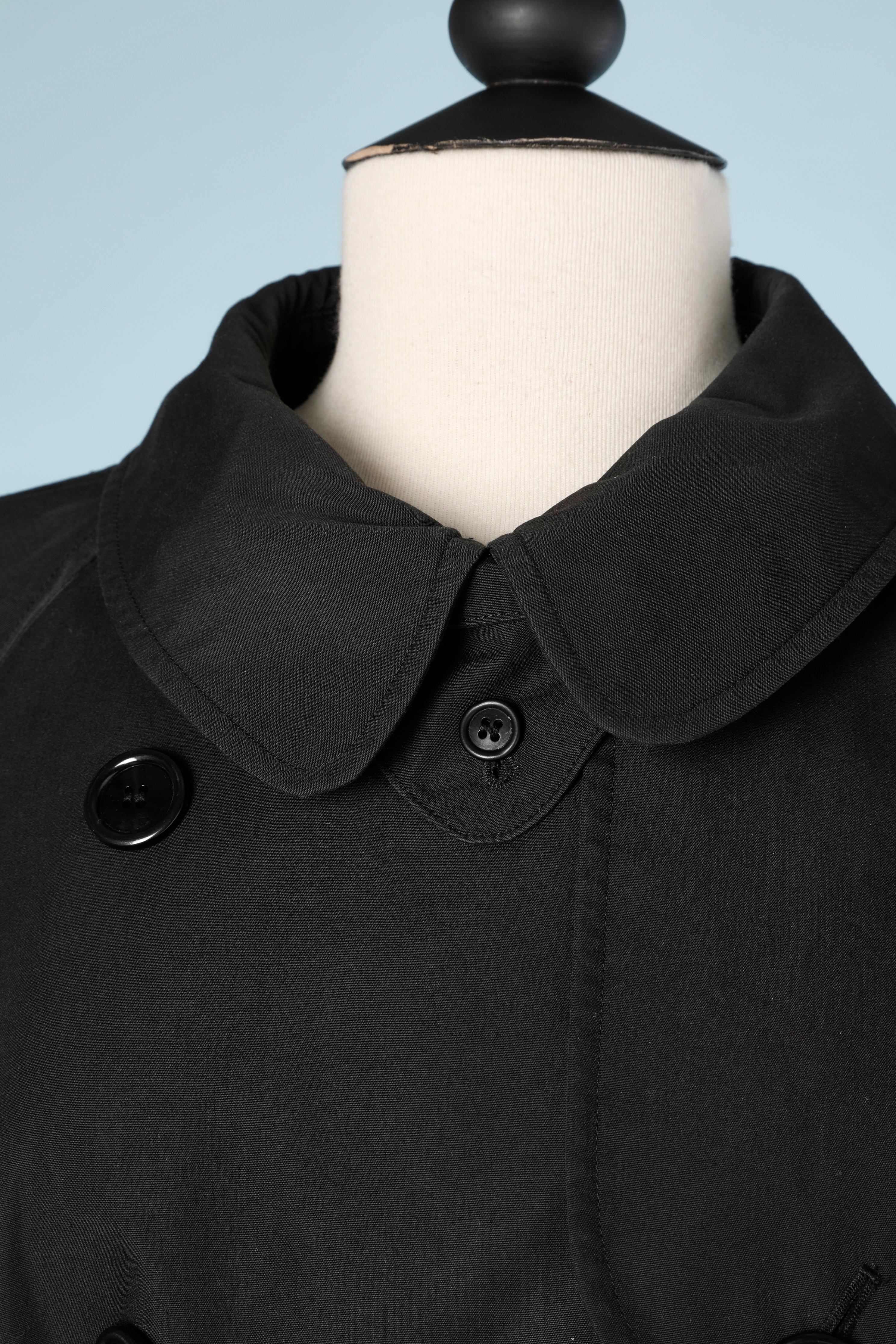 Black double -breasted trench-coat . Cotton fabric and lining. 
SIZE 36 (Fr) 