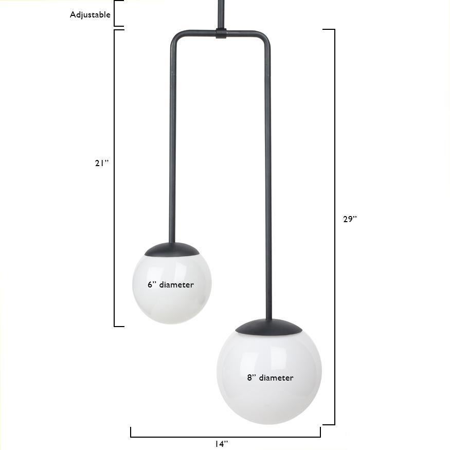 An asymmetrical metal pendant light to illuminate your dining room, living room, kitchen. This modern lighting pendant also works well in a commercial setting restaurant, retail, or office space.
Designed by Michele Varian
Powder coated