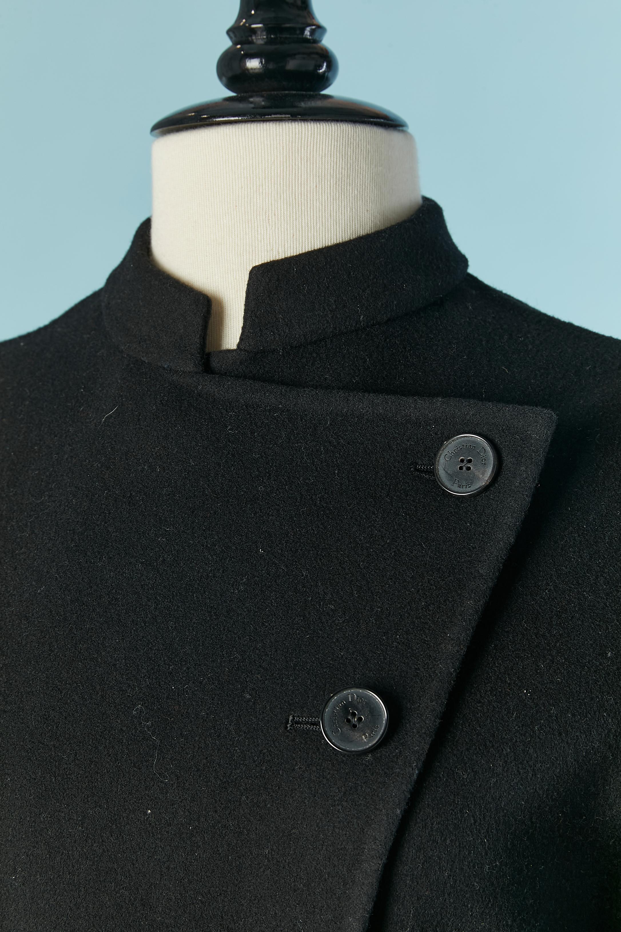 Black Double-face cashmere coat. Branded button and buttonhole closure on the front and on the cuffs. 
Pocket on both side with silk lining. 
Split on the middle back, lenght = 58cm
SIZE 38 (Fr) M 