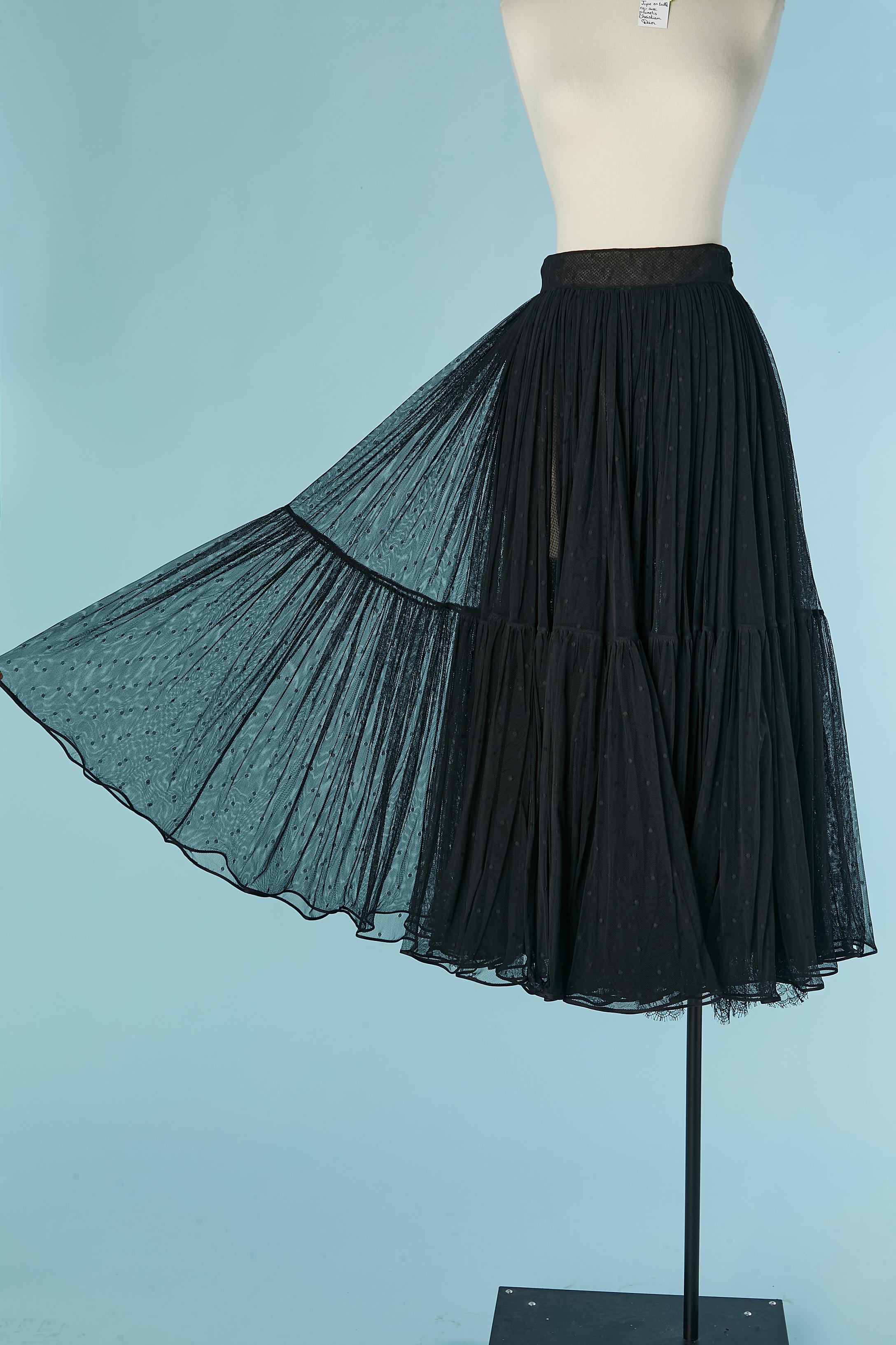 Black double lay of plumetis tulle and black lace ruffle skirt ( the lace is under the tulle and only on the edge )  Zip and hook&eye closure on the left side. 
SIZE 36/ S 
