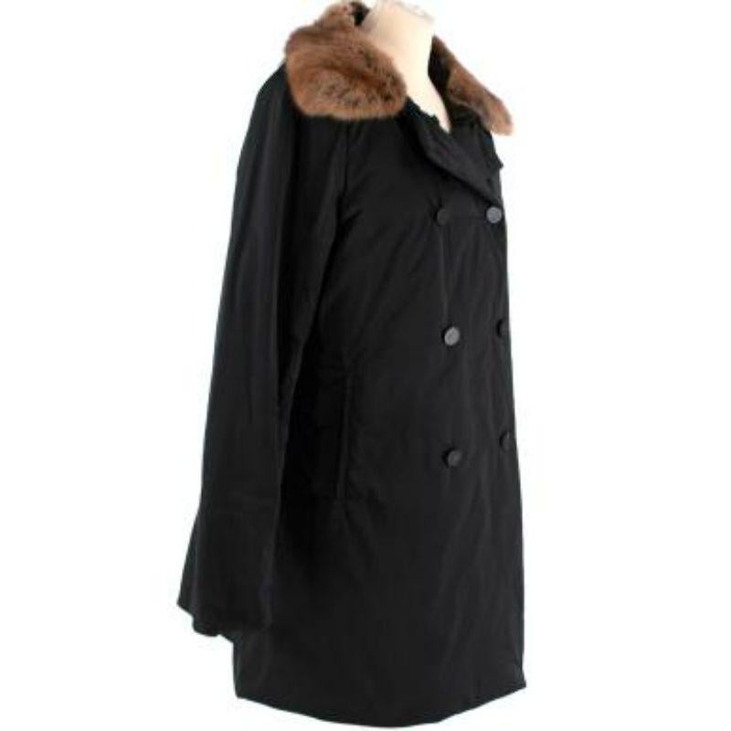 Moncler black down filled squirrel fur trimmed coat
 
 
 
 - Midweight, down-filled coat with smooth outer, and ribbed interior
 
 - Brown, short pile squirrel fur trim 
 
 - Button fastening 
 
 - Side welt pockets 
 
 
 
 Materials:
 
 Shell: 100%