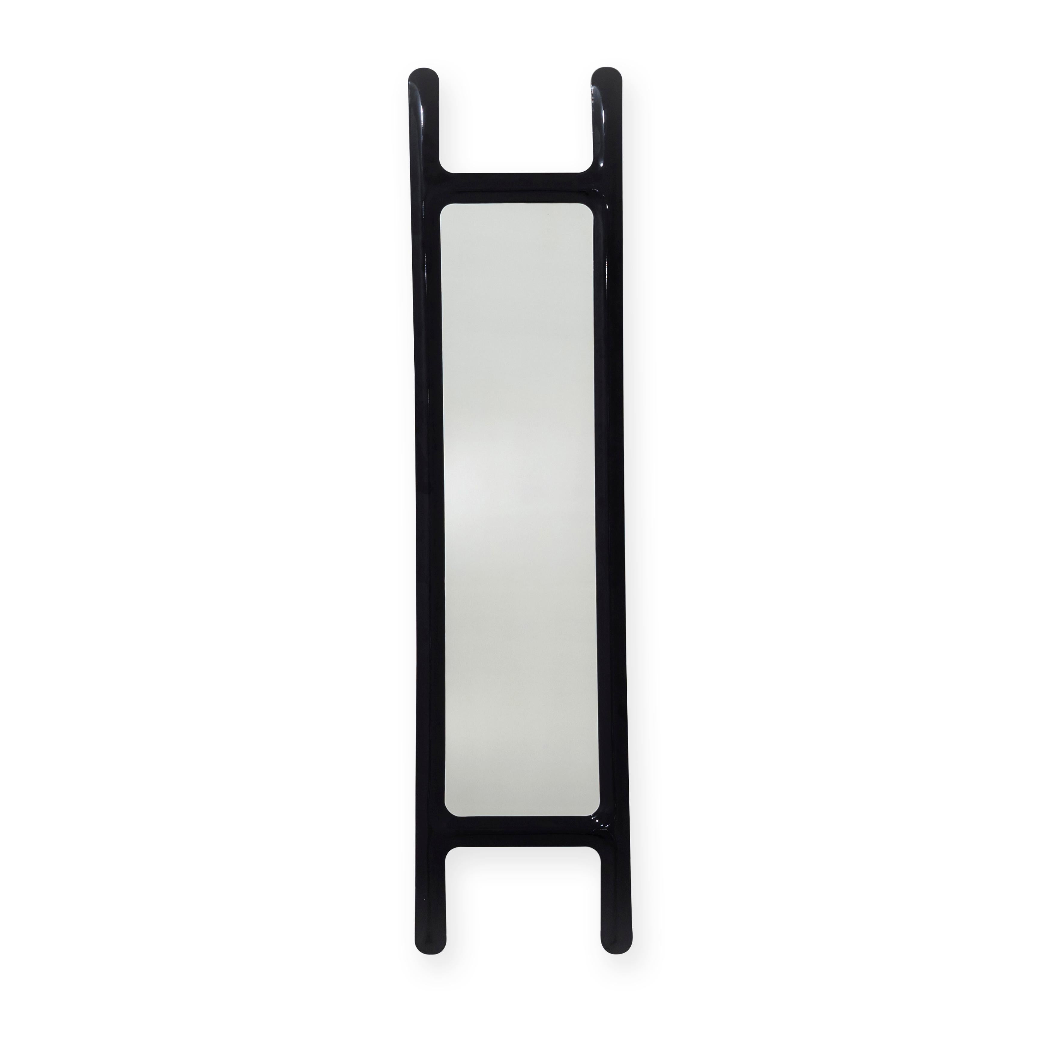 Black drab sculptural wall mirror by Zieta
Dimensions: D 6 x W 46 x H 188 cm 
Material: Mirror, carbon steel. 
Finish: Powder-coated in black glossy.
Also available in colors: stainless steel, or powder-coated. 


A DRAB mirror is an object
