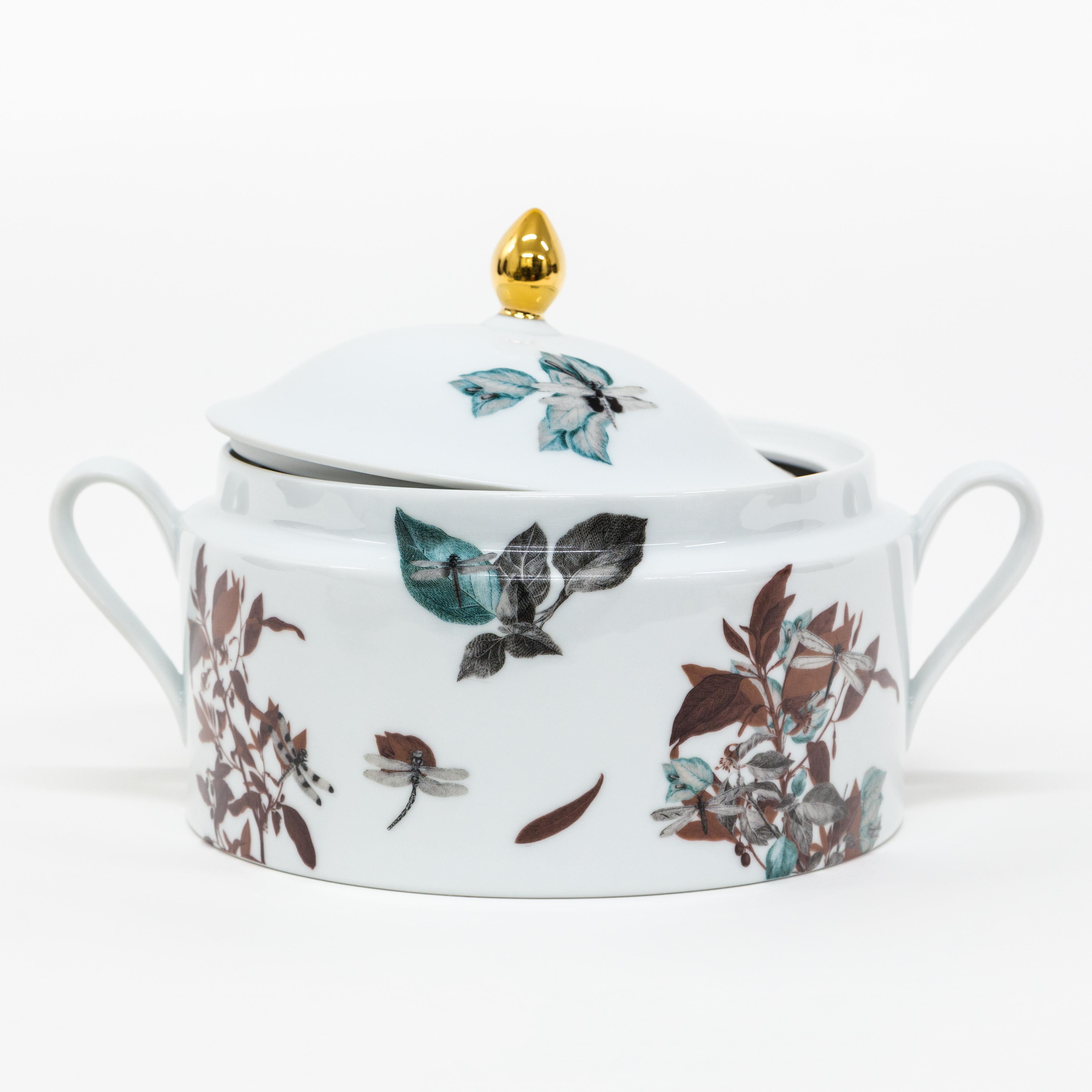 This soup tureen is a Grand Tour piece by Vito Nesta that is part of the Black Dragon Pool porcelain collection which inspired by the famous Chinese pond of the same name, located in the scenic Jade Spring Park. The designs in this collection