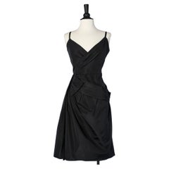 Black draped cocktail dress in "faille " with bow Christian Dior 
