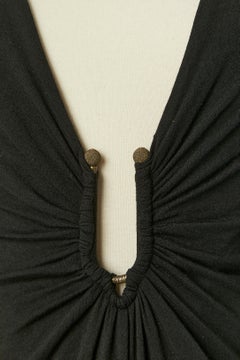 Black draped jersey cocktail dress with deep V neckline Just Cavalli