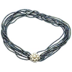 Black Dyed Pearl Strand Necklace with 14 Karat White Gold Pearl Accented Clasp Black Dyed Pearl Strand Necklace with 14 Karat White Gold Pearl Accented Clasp