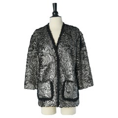 Black edge to edge black faux fur with silver coated CHANEL