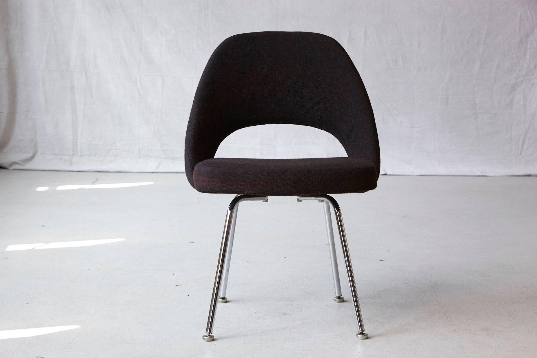 Original Eero Saarinen executive armless side or dining chair in black wool fabric with chrome legs.
Original fabric and foam in very good condition.
