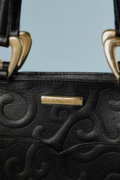 Black emboss leather hand bag Yves Saint Laurent