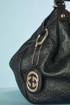 Black embossed leather bag Guccissima Gucci Numbered