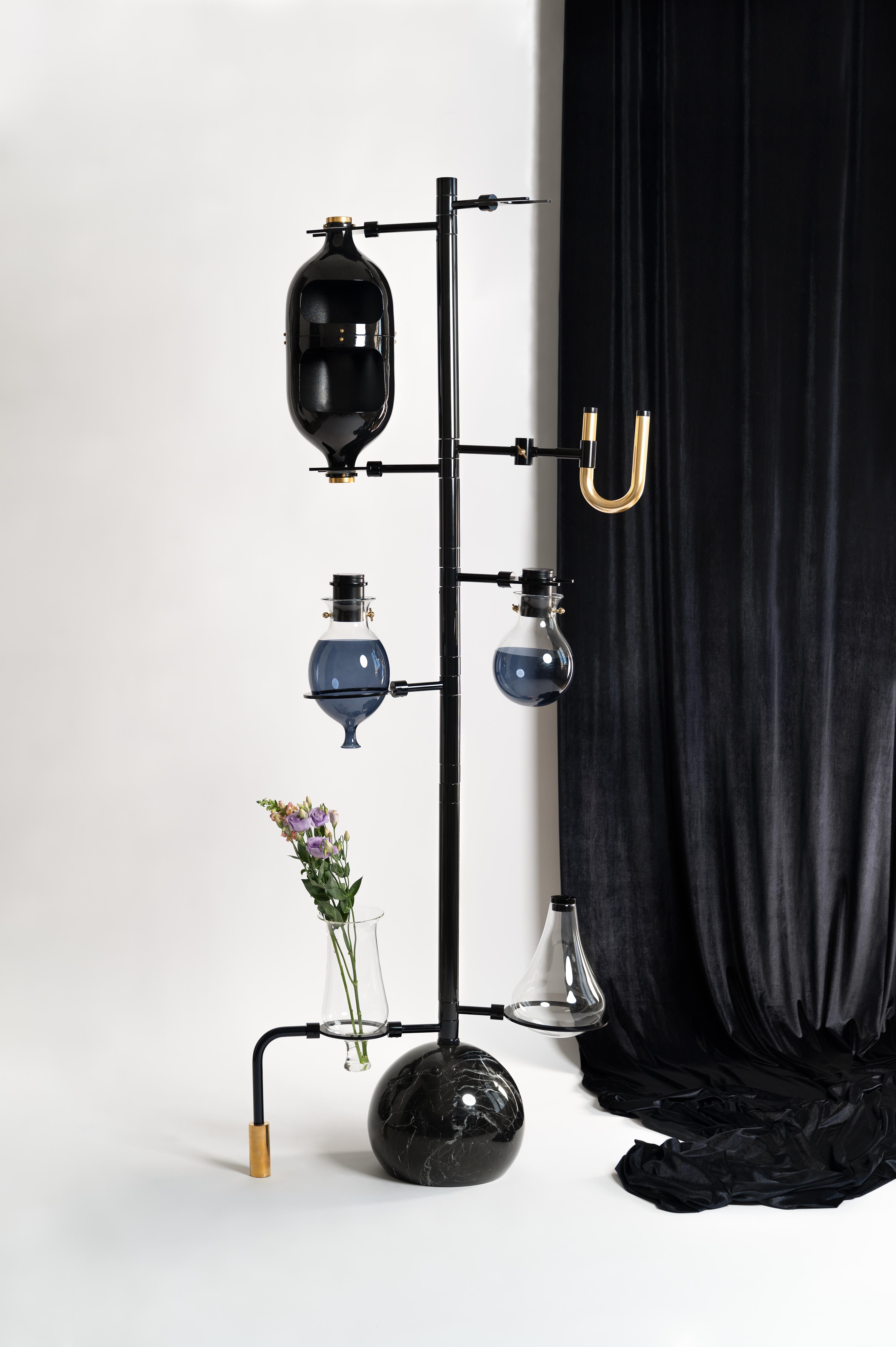 Black Emotional Lab Floor Lamp by Hania Jneid
Dimensions: W 100 x D 100 x H 190 cm
Materials: Anodised Aluminum, screws and fixing components in Brass.

The Emotional Lab is a multifunctional sculptural art piece, that encompass-es lighting, a
