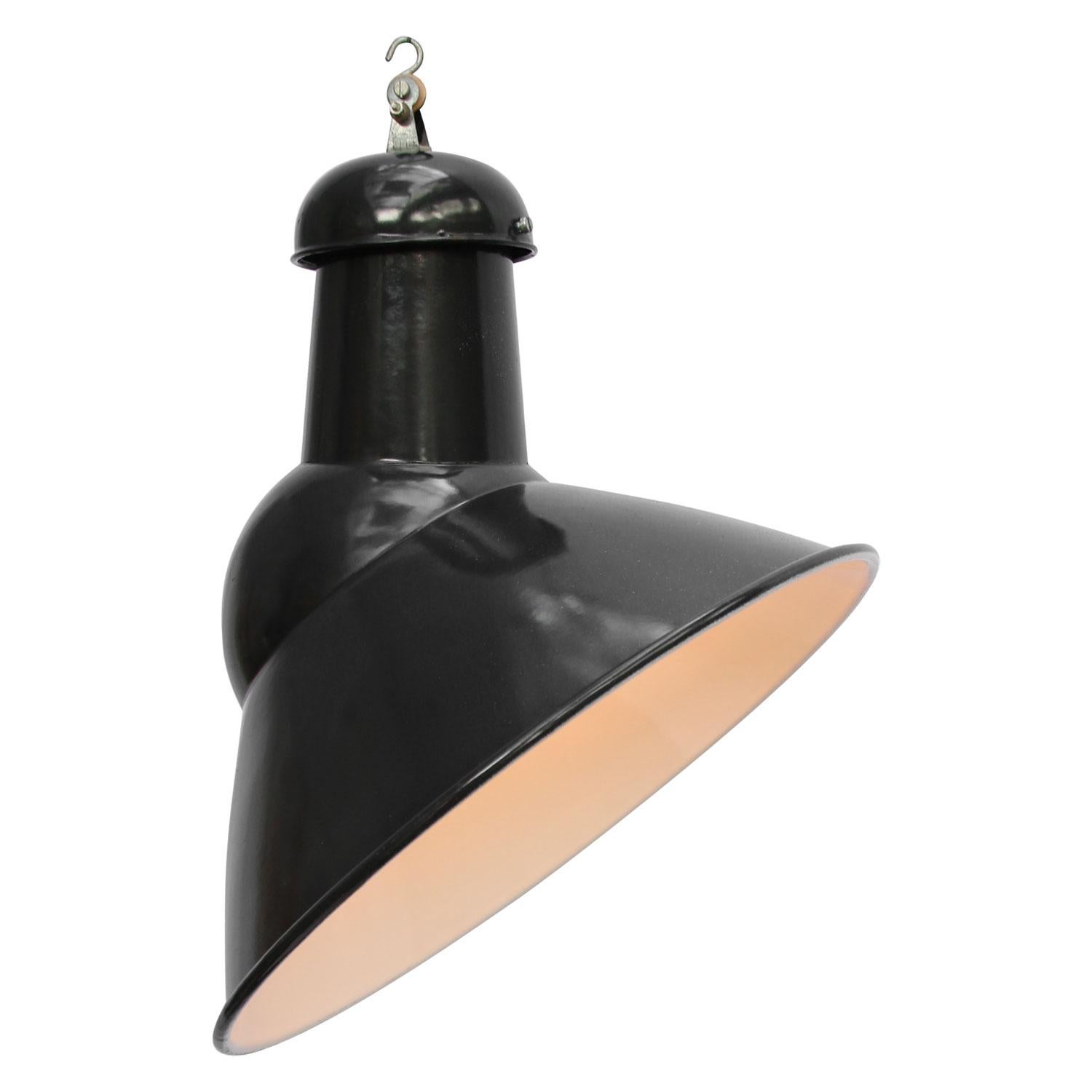 Asymmetrical black industrial lamp.
Rare model used in warehouses and factories

Weight: 1.90 kg / 4.2 lb

Priced per individual item. All lamps have been made suitable by international standards for incandescent light bulbs, energy-efficient