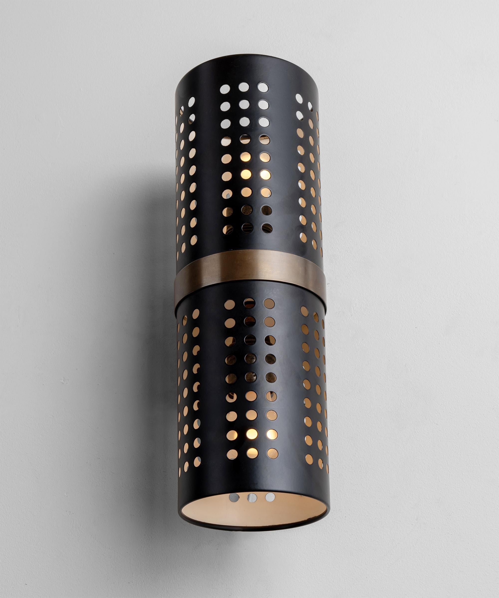 Perforated shades in satin black enamel finish, with brass fittings.

Made in Italy

Dimensions: 4.75”w x 7”d x 14.25”h
The backplate can be customized. Please notify us the backplate size, that will be necessary before the order is finalized.