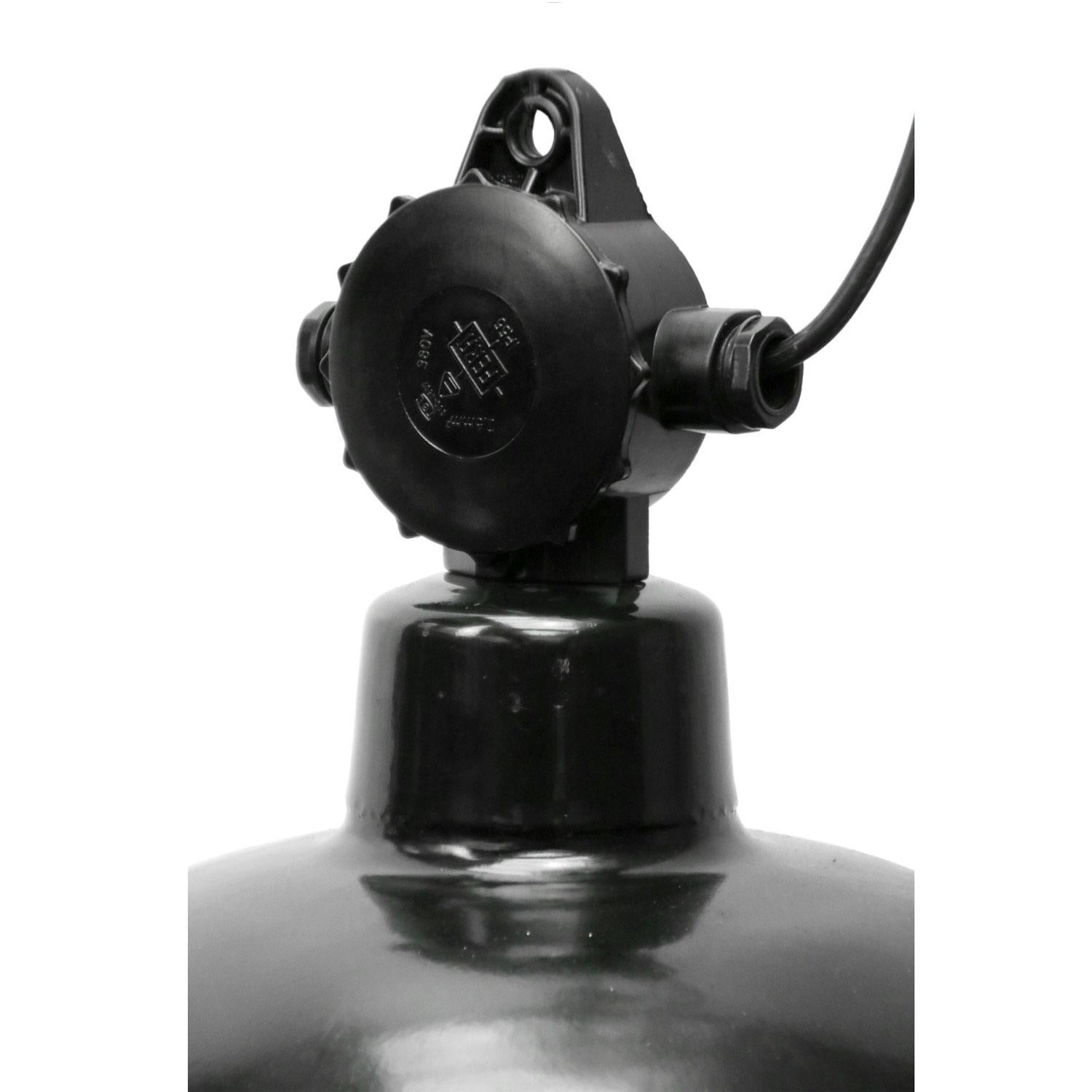 The German industrial classic!
Used in warehouses and factories in Germany.
Black enamel top with Bakelite top.

Weight: 1.57 kg / 3.5 lb

Priced per individual item. All lamps have been made suitable by international standards for