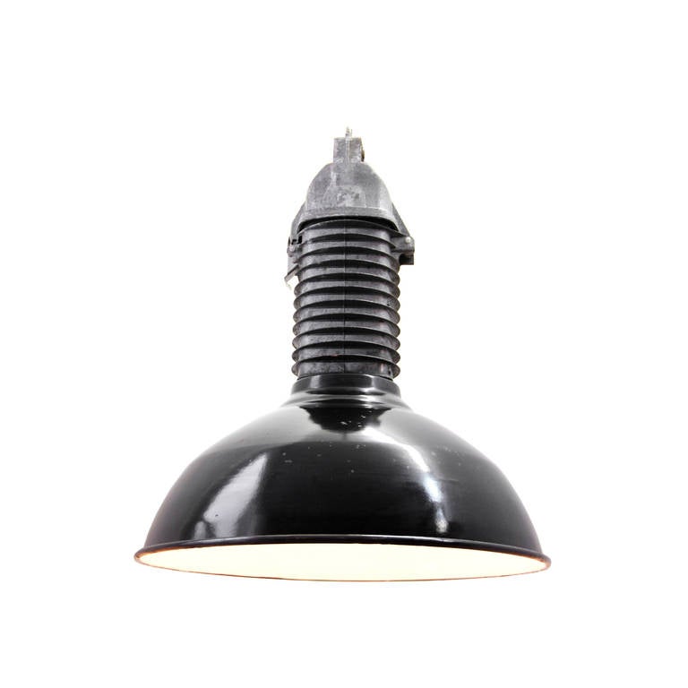Black industrial hanging lamps, with cast aluminum top. 

Weight: 4.40 kg / 9.7 lb

Priced per individual item. All lamps have been made suitable by international standards for incandescent light bulbs, energy-efficient and LED bulbs. E26/E27