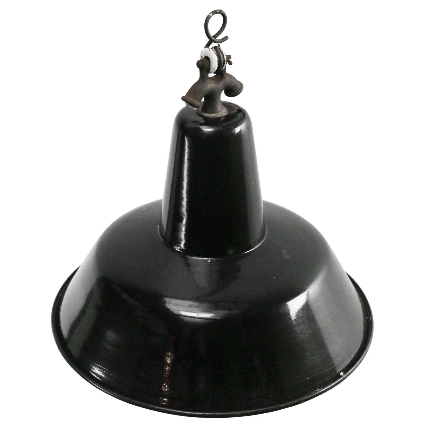 Dutch industrial hanging lamp
black enamel white interior

Weight: 0.80 kg / 1.8 lb

Priced per individual item. All lamps have been made suitable by international standards for incandescent light bulbs, energy-efficient and LED bulbs. E26/E27