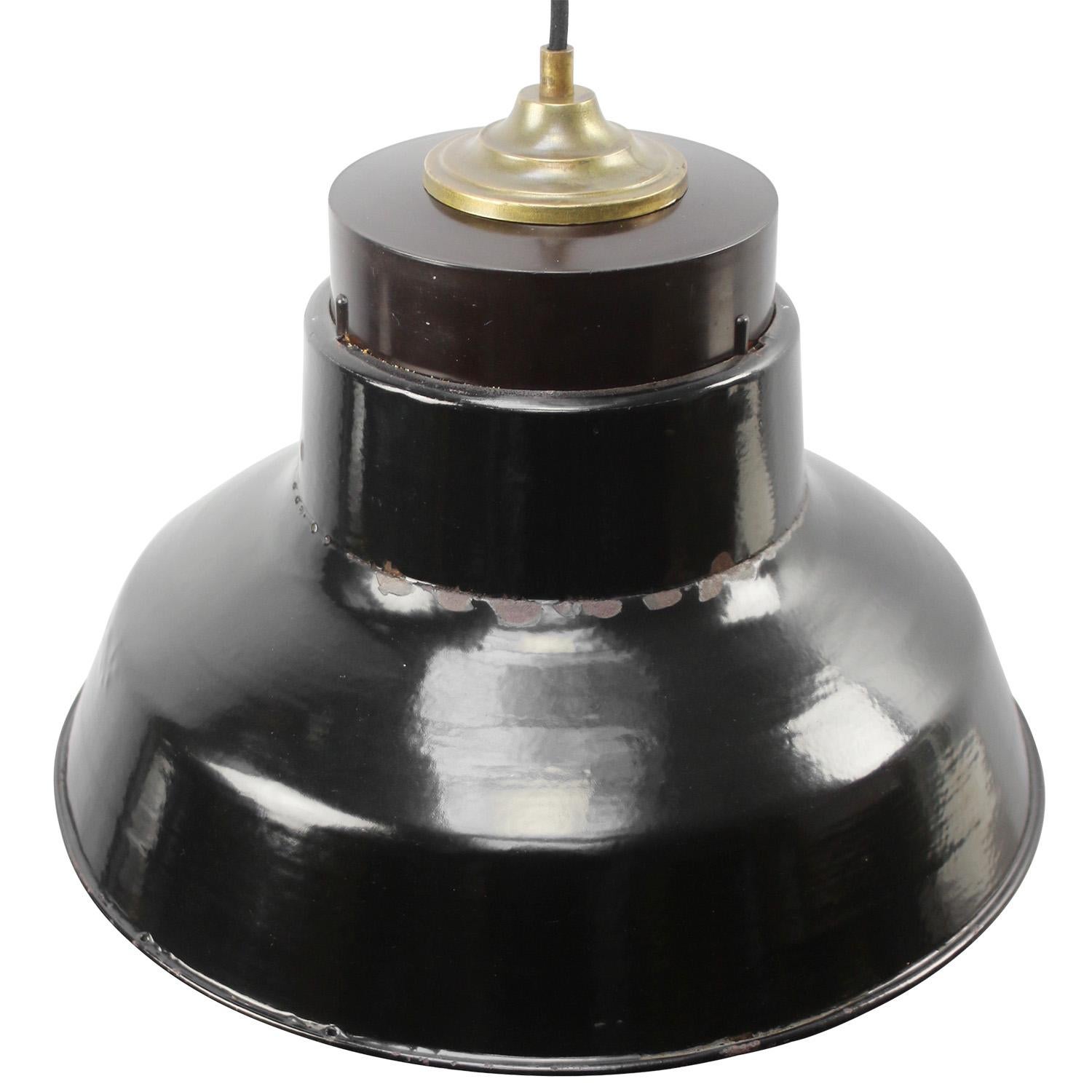 Industrial light. Black enamel white interior.
Bakelite and brass top. Clear glass

Weight: 3.30 kg / 7.3 lb

Priced per individual item. All lamps have been made suitable by international standards for incandescent light bulbs, energy-efficient and