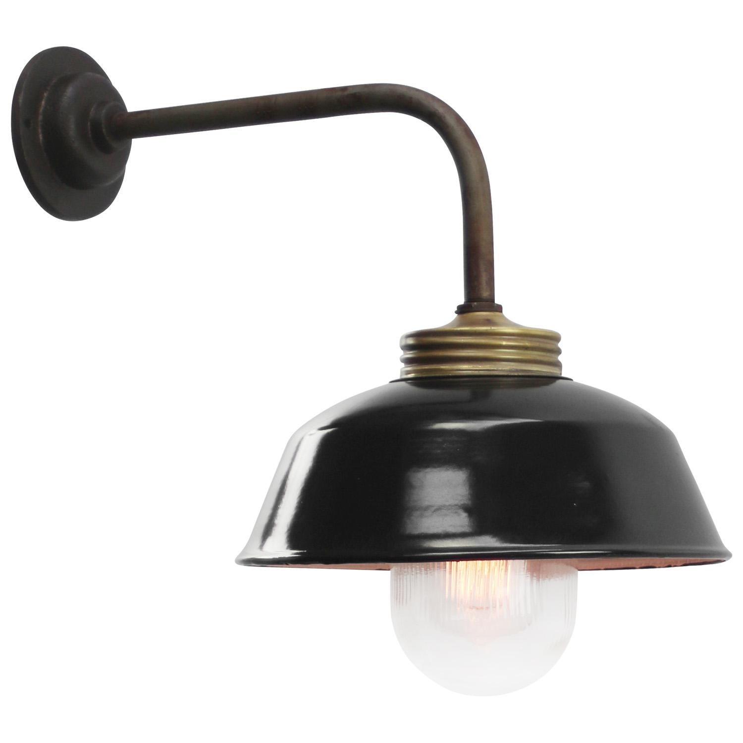 Rust Cast Iron Barn light
Black enamel shade, brass top, clear striped glass

Diameter cast iron wall piece: 10.5 cm / 4 inches
2 holes to secure

Weight: 2.00 kg / 4.4 lb

Priced per individual item. All lamps have been made suitable by