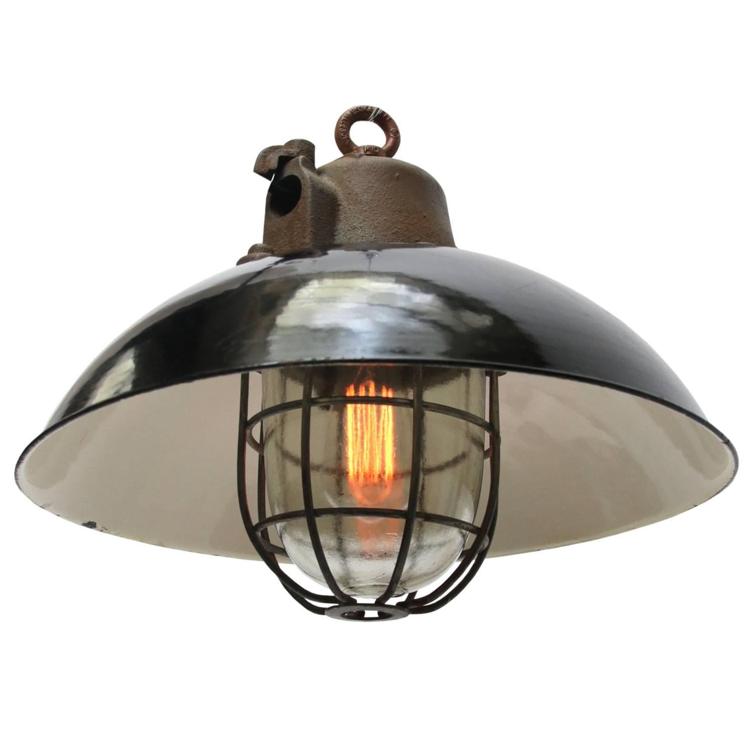 black enamel and cast iron. Clear glass.

Weight: 9.0 kg / 19.8 lb.

All lamps have been made suitable by international standards for incandescent light bulbs, energy-efficient and LED bulbs. E26/E27 bulb holders and new wiring are CE certified or