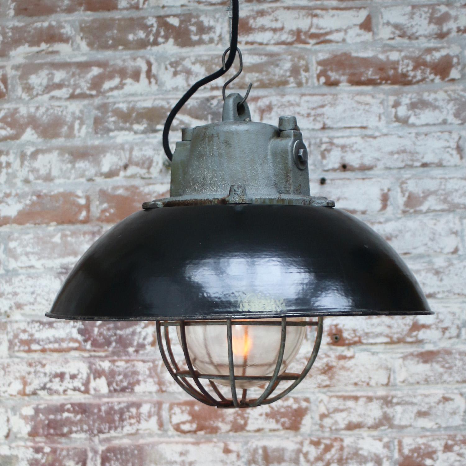 Black Enamel Vintage Industrial Cast Iron Clear Glass Pendant Light In Good Condition For Sale In Amsterdam, NL