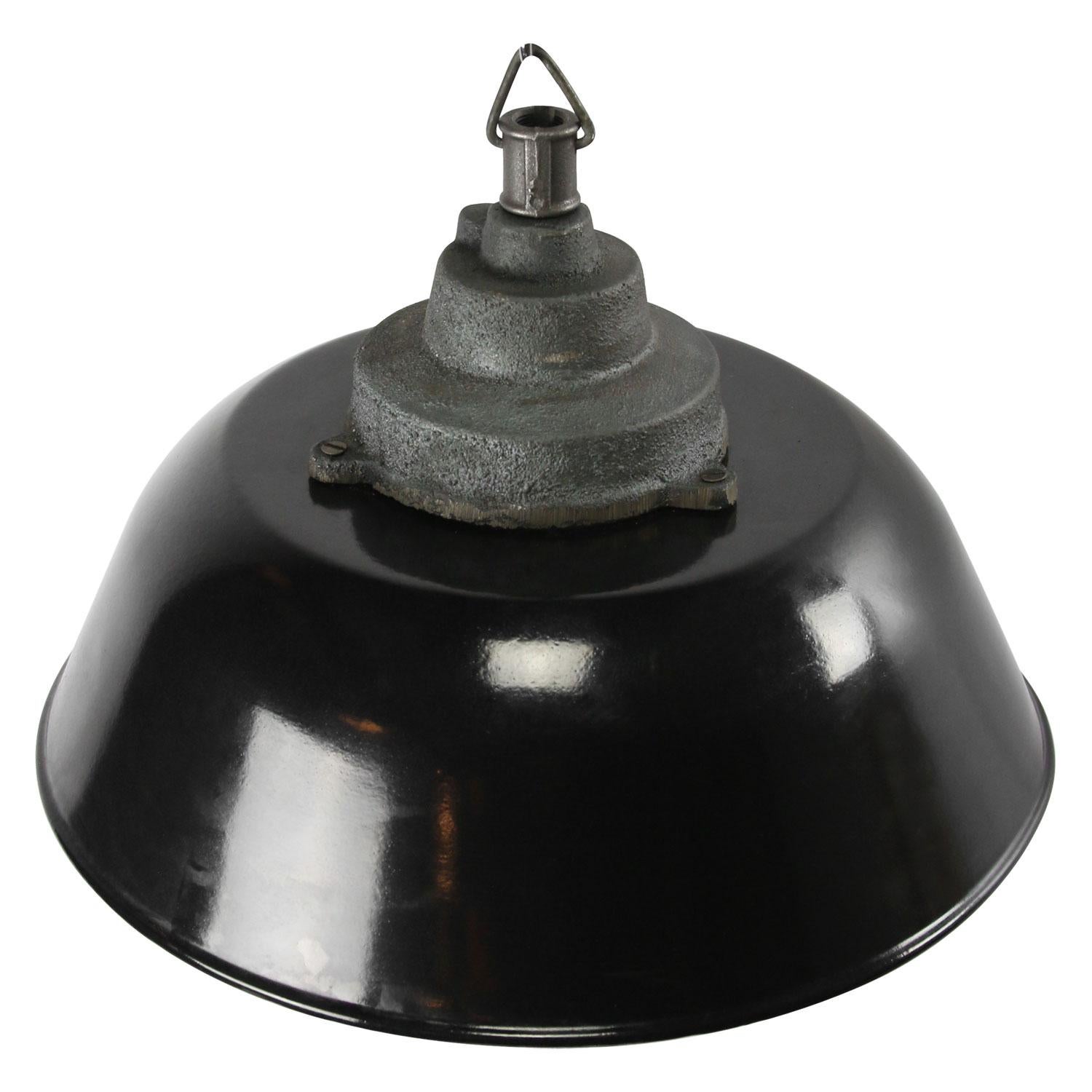 Factory pendant. Black enamel with white interior. Cast iron top.

Measures: Weight 3.2 kg / 7.1 lb

Priced per individual item. All lamps have been made suitable by international standards for incandescent light bulbs, energy-efficient and LED