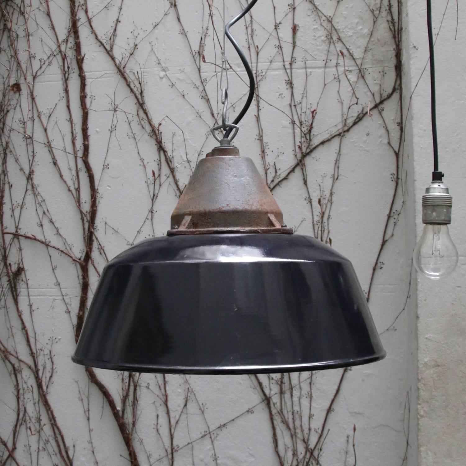 Factory hanging lamp. Black enamel white interior. Cast iron top.

Weight: 5.0 kg / 11 lb

Priced per individual item. All lamps have been made suitable by international standards for incandescent light bulbs, energy-efficient and LED bulbs. E26/E27