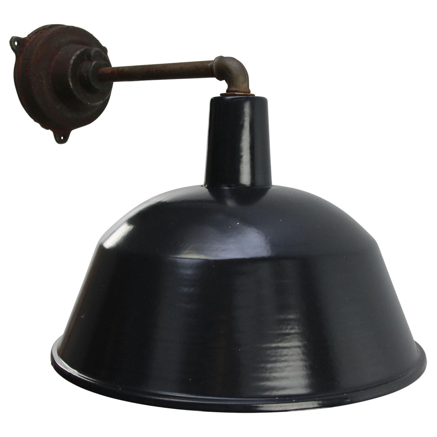 Factory wall light
Black / very dark gray enamel, white interior

Weight: 3.1 kg / 6.8 lb

Priced per individual item. All lamps have been made suitable by international standards for incandescent light bulbs, energy-efficient and LED bulbs.