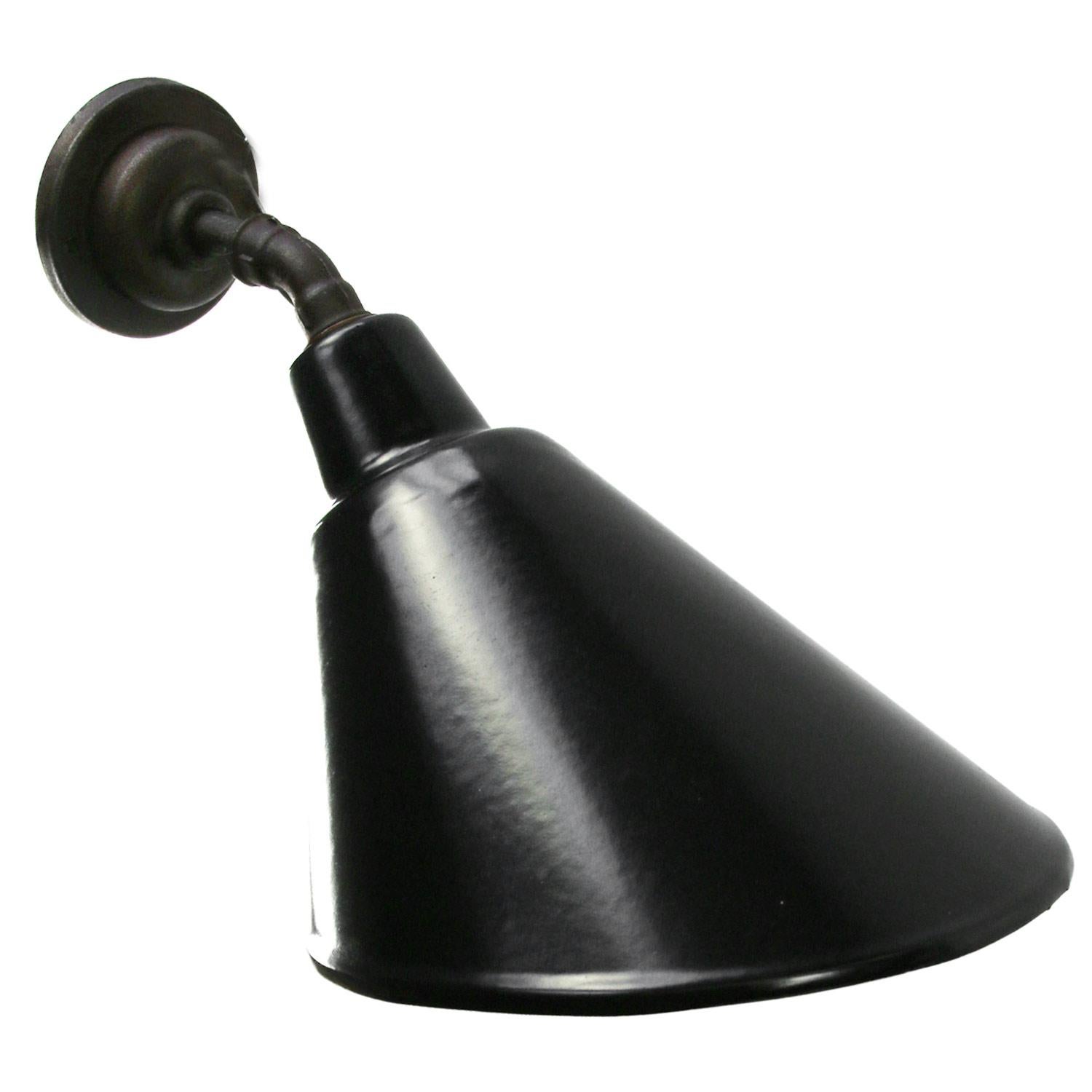 Factory wall light
black enamel, white interior

Diameter cast iron wall piece: 10.5 cm / 4”.
2 holes to secure

E27/E26

Weight: 2.00 kg / 4.4 lb

Priced per individual item. All lamps have been made suitable by international standards for