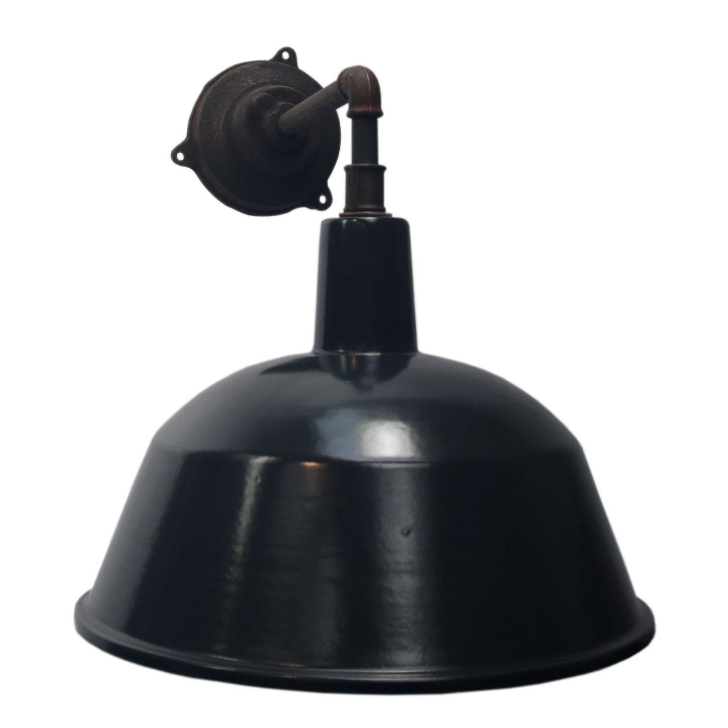 Factory wall light
Black / very dark gray enamel, white interior

Weight: 3.1 kg / 6.8 lb

Priced per individual item. All lamps have been made suitable by international standards for incandescent light bulbs, energy-efficient and LED bulbs. E26/E27