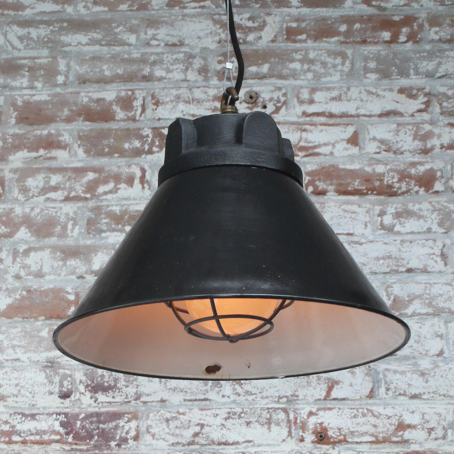 Mid-20th Century Black Enamel Vintage Industrial Cast Iron Frosted Glass Pendant Light For Sale