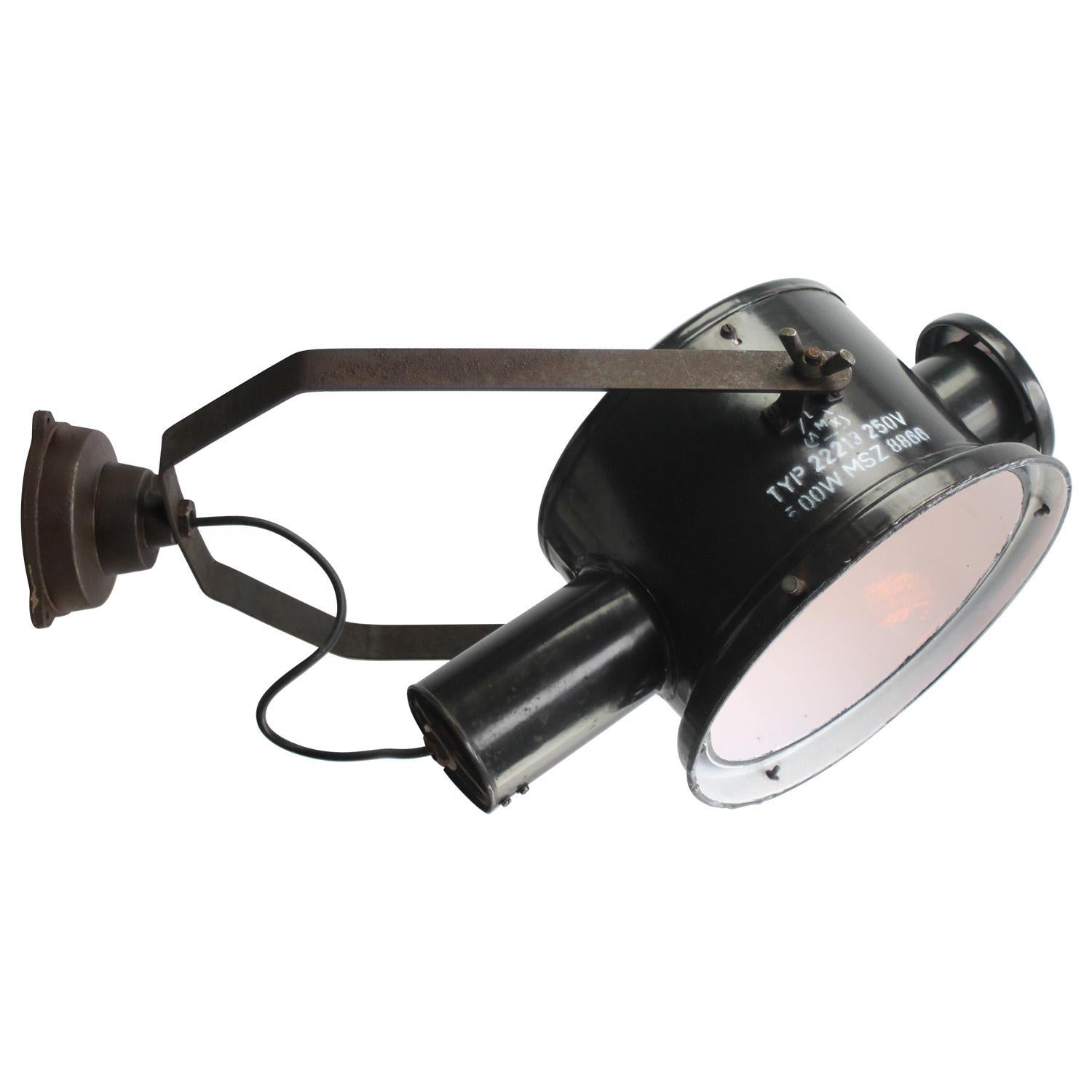 Black enamel, cast iron parts and wall piece
Adjustable industrial wall light

Diameter wall mount 12 cm

Weight: 6.20 kg / 13.7 lb

Priced per individual item. All lamps have been made suitable by international standards for incandescent light