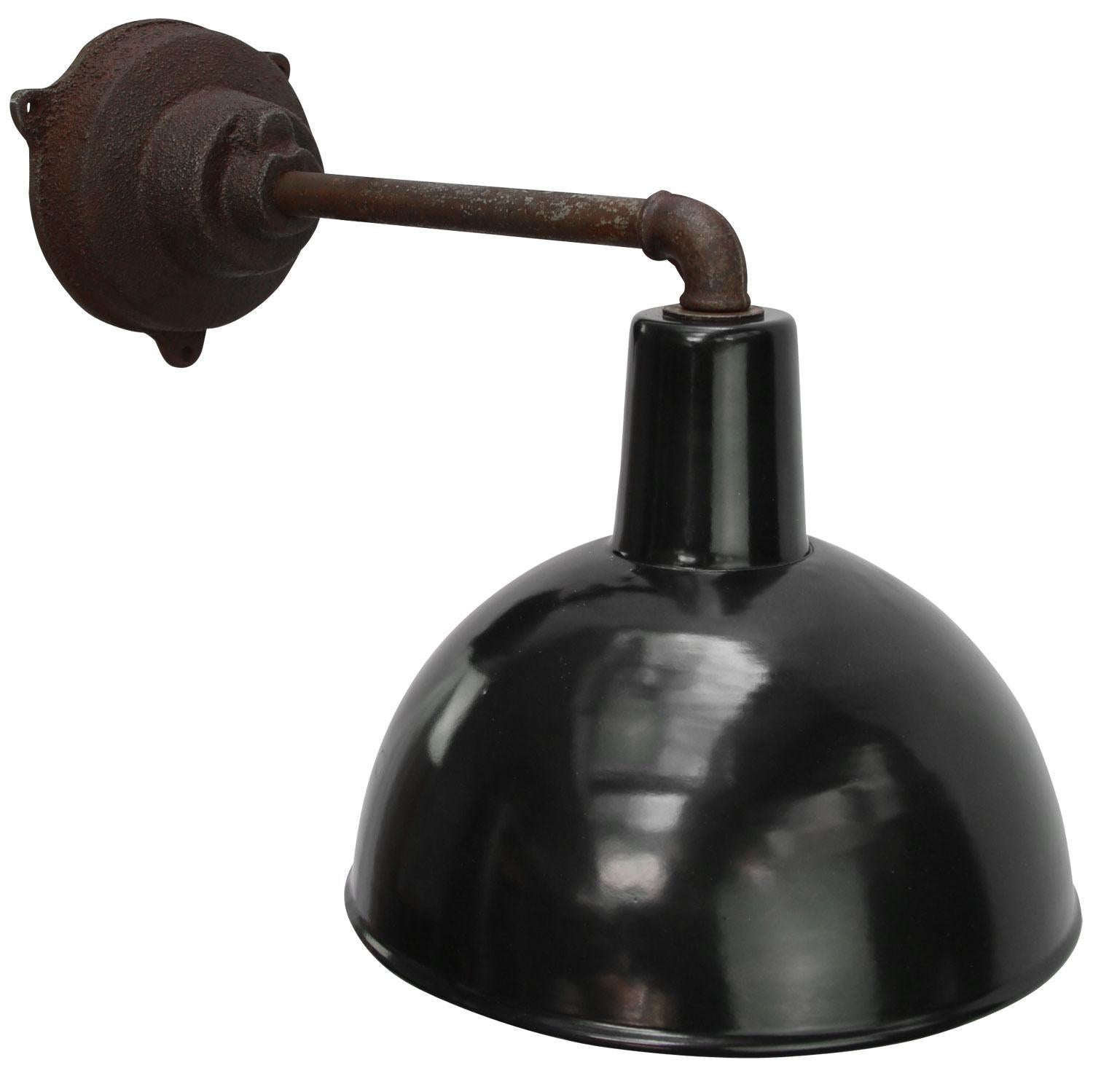 Factory wall light. Black enamel. White interior. 

Diameter cast iron wall piece: 12 cm, three holes to secure.

Weight: 3.00 kg / 6.6 lb

All lamps have been made suitable by international standards for incandescent light bulbs,