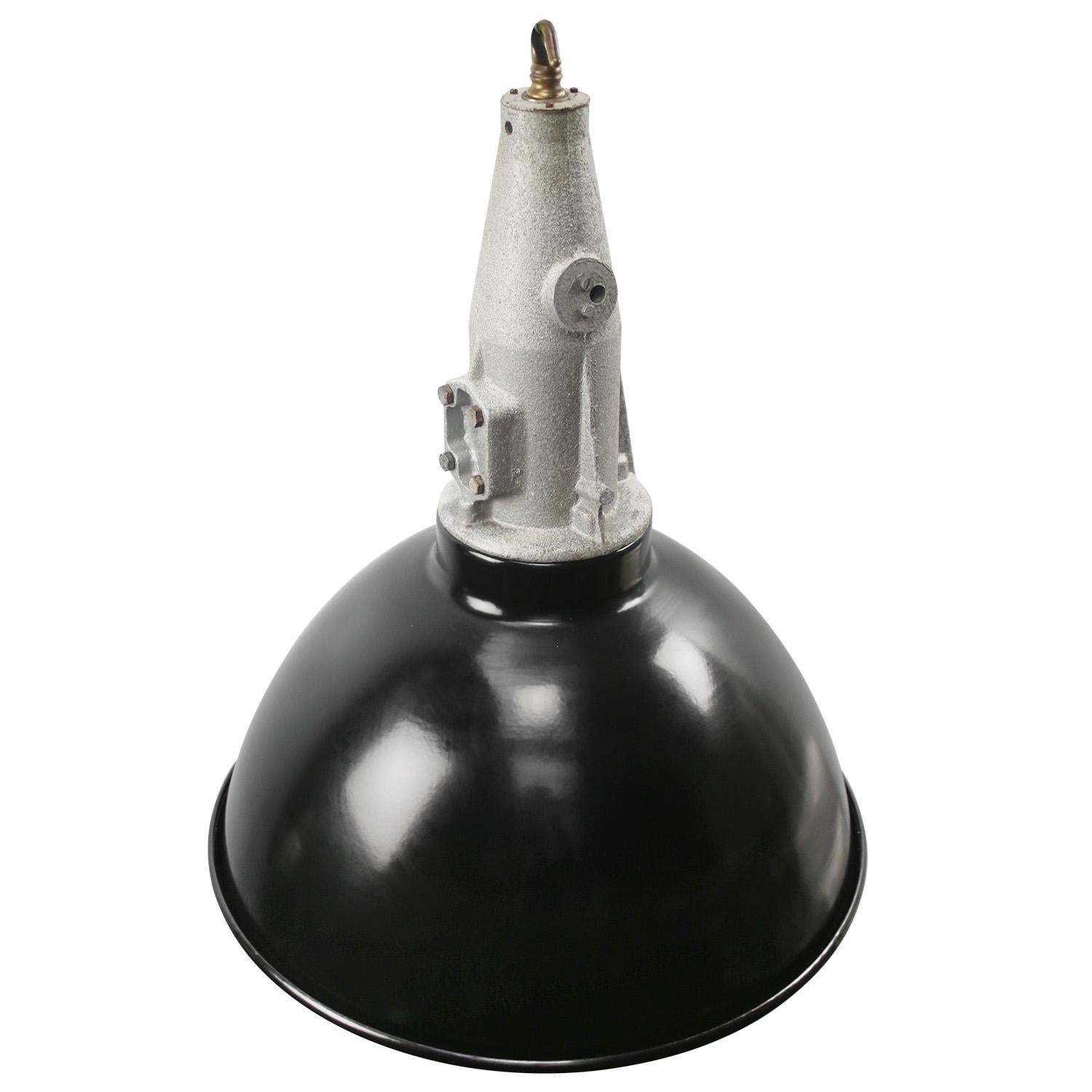 Vintage industrial pendant.
Black enamel shade with white interior
Cast aluminum top

Weight: 4.60 kg / 10.1 lb

Priced per individual item. All lamps have been made suitable by international standards for incandescent light bulbs, energy-efficient