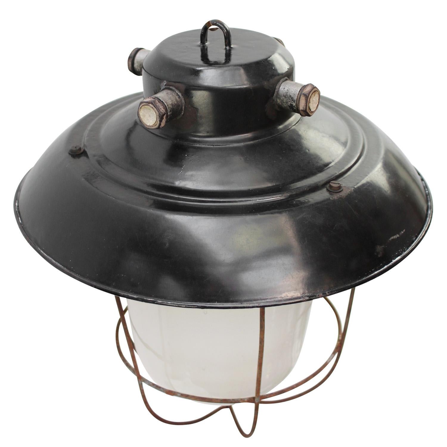 Black enamel industrial lamp. Frosted glass.

Weight 3.0 kg / 6.6 lb. 

Priced per individual item. All lamps have been made suitable by international standards for incandescent light bulbs, energy-efficient and LED bulbs. E26/E27 bulb holders and