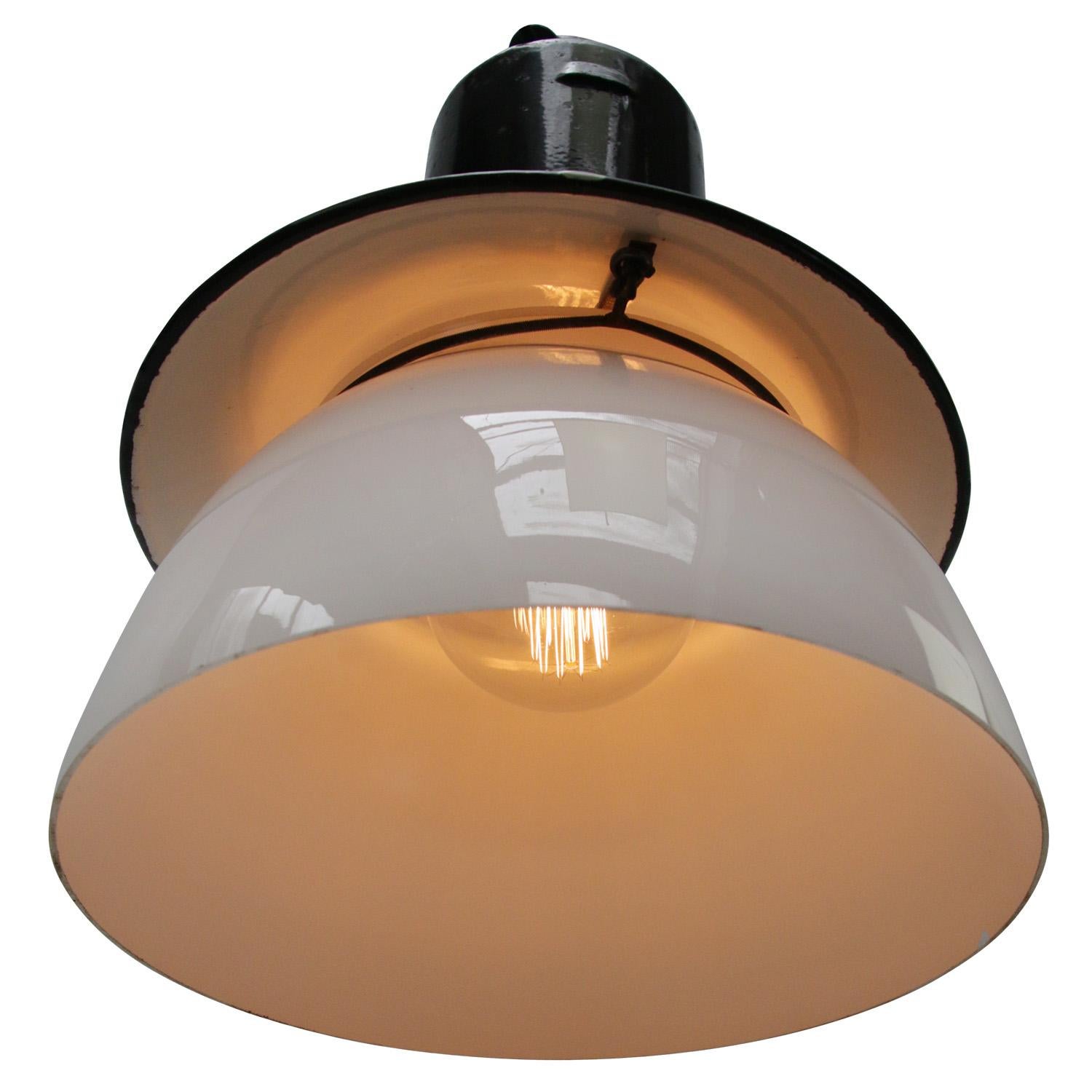 Black enamel factory pendant light
White glass. Cast iron top

Weight 5.90 kg / 13 lb

Priced per individual item. All lamps have been made suitable by international standards for incandescent light bulbs, energy-efficient and LED bulbs.