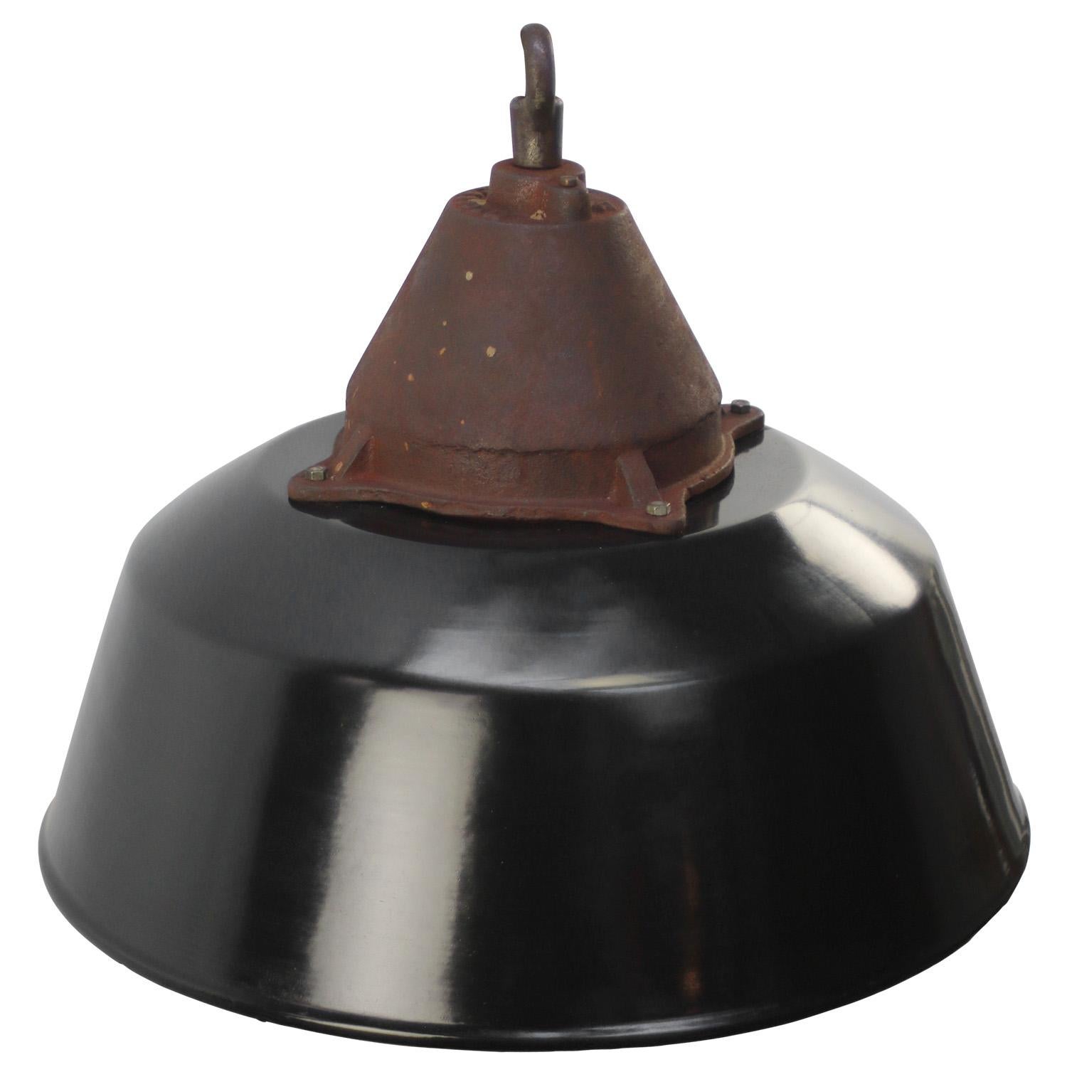 Factory hanging lamp. Black enamel. White interior.
Clear glass. Cast iron top.

Weight 5.5 kg / 12.1 lb

Priced per individual item. All lamps have been made suitable by international standards for incandescent light bulbs, energy-efficient and LED