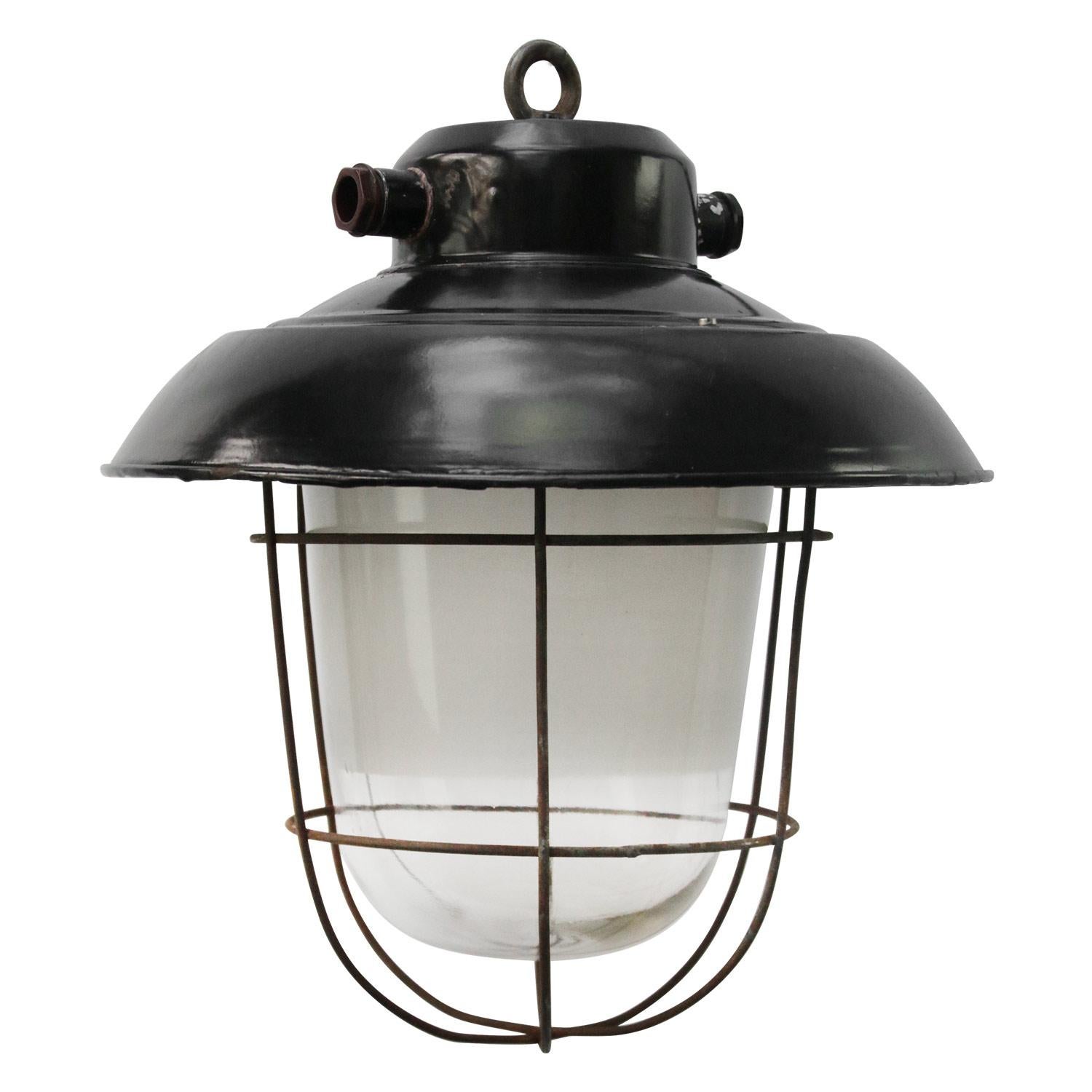 Black enamel industrial lamp. Clear glass with frosted semitransparent stripe in middle.
For use outdoors as well as indoors. 

Weight 3.0 kg / 6.6 lb. 

Priced per individual item. All lamps have been made suitable by international standards