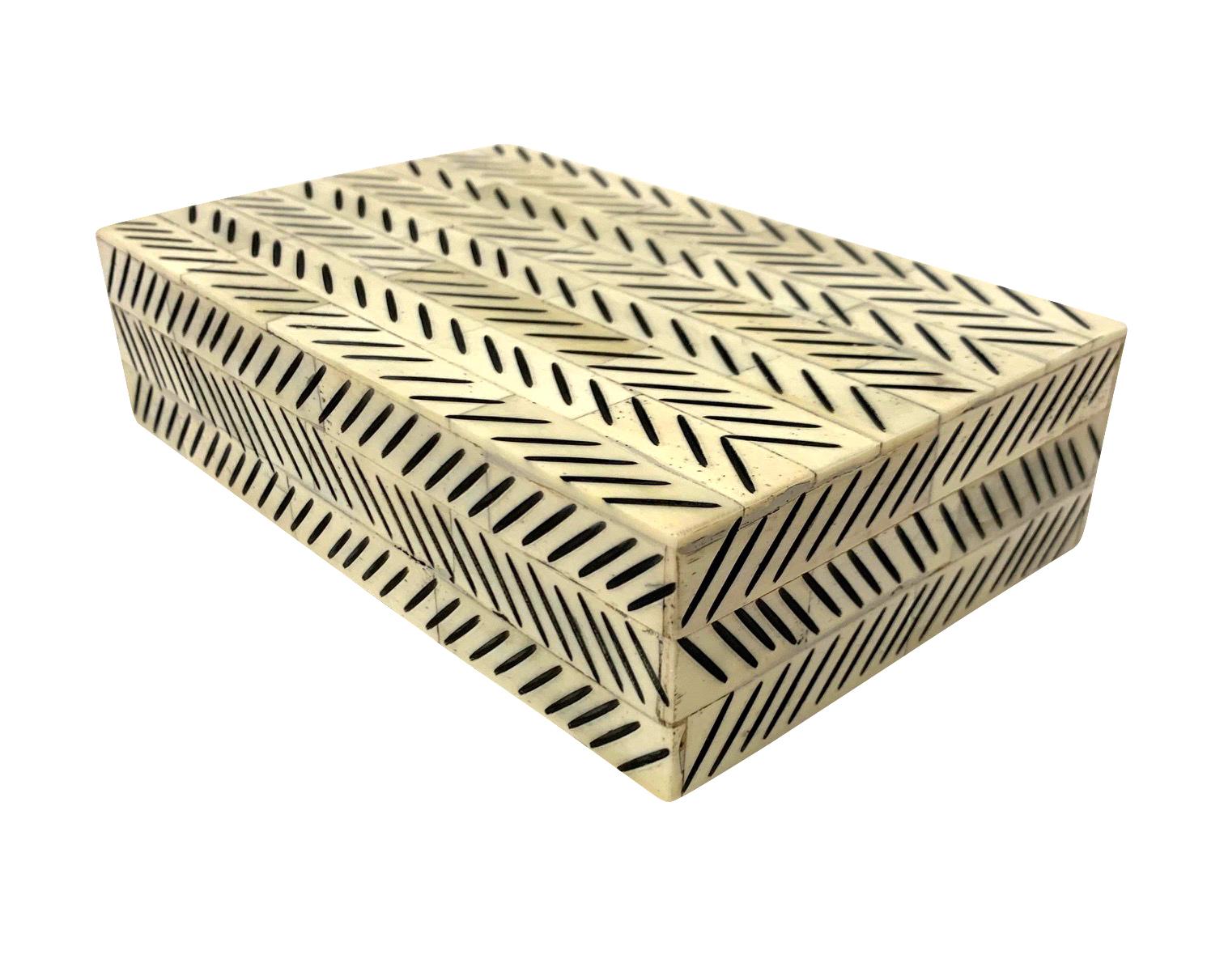 Contemporary Indian lidded bone box with etched chevron pattern design.
Part of a large collection of bone boxes