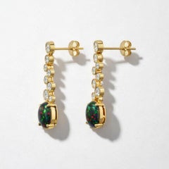 Schwarzer äthiopischer Opal und farbloser Topas, Ohrstecker, 14k Gold
