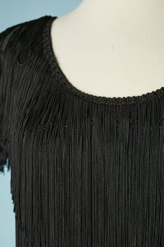 Black evening dress with fringes on Lycra base