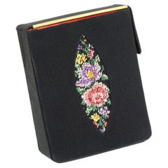 Retro Black Faille Hard-Sided Cigarette Case with Needlepoint Marquis, 1950s