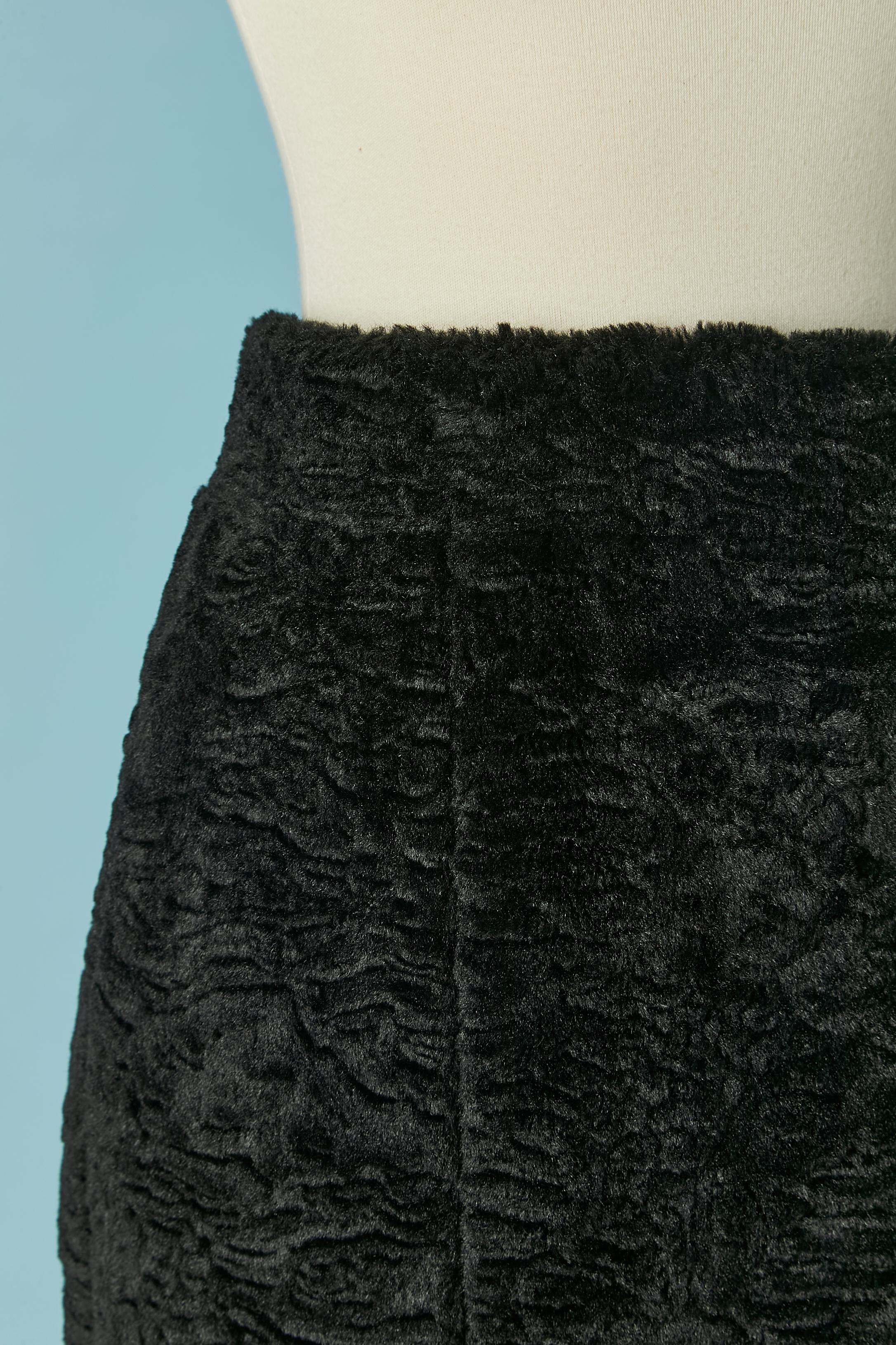 Black Faux fur skirt with branded button, buttonhole and zip on the middle back. 
Main fabric composition: 52% polyacrylic, 30% modacrylic, 9% polyester, 8% rayon. Lining: 64% acetate, 36% polyamide. 
SIZE 42 (It) 38 (Fr) 8 (Us) M 