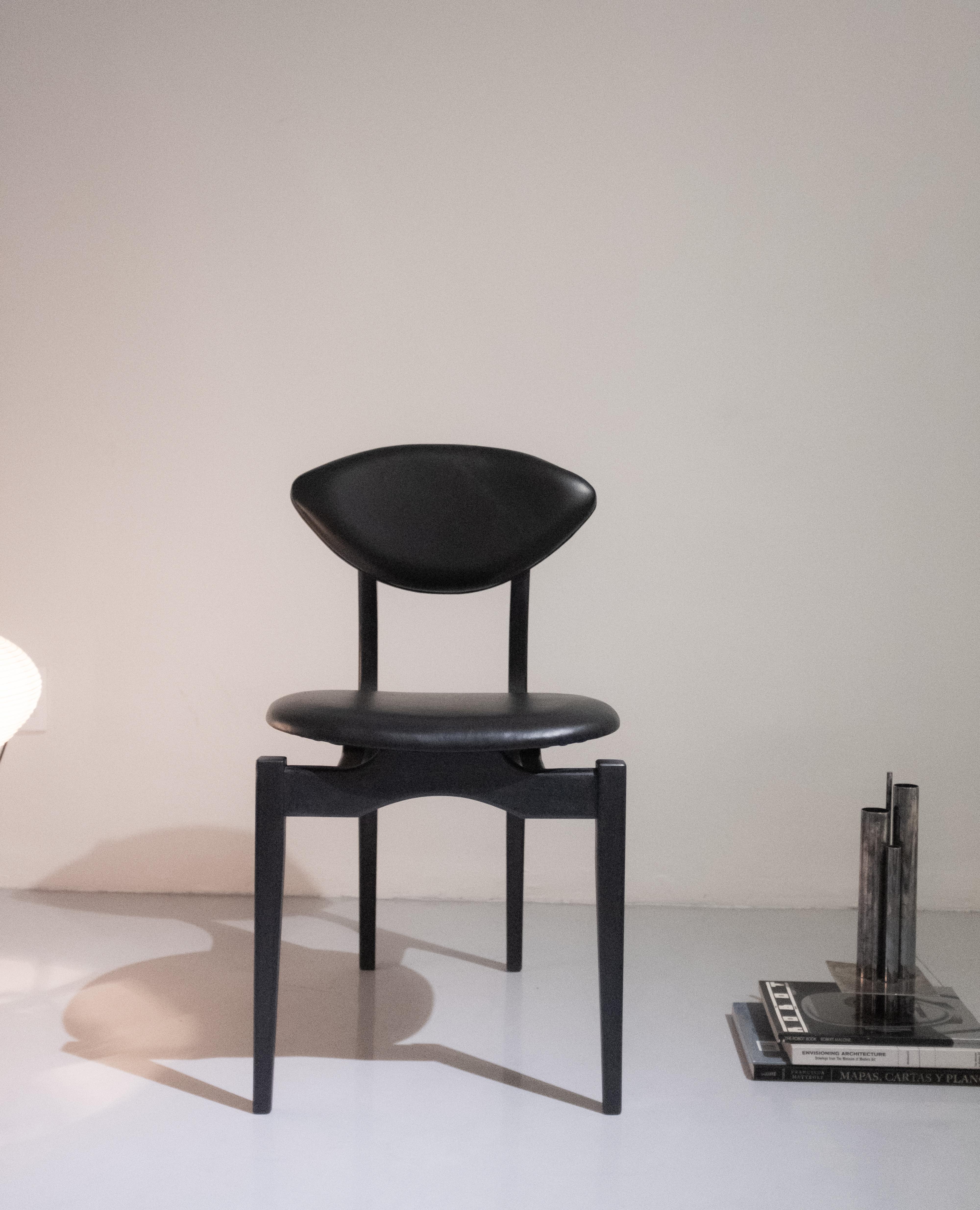 Black Femur dining chair by Atra Design
Dimensions: D 58.5 x W 45 x H 85 cm
Materials: leather, walnut
Available in leather or fabric seat and in other colors.

Atra Design
We are Atra, a furniture brand produced by Atra form a mexico
