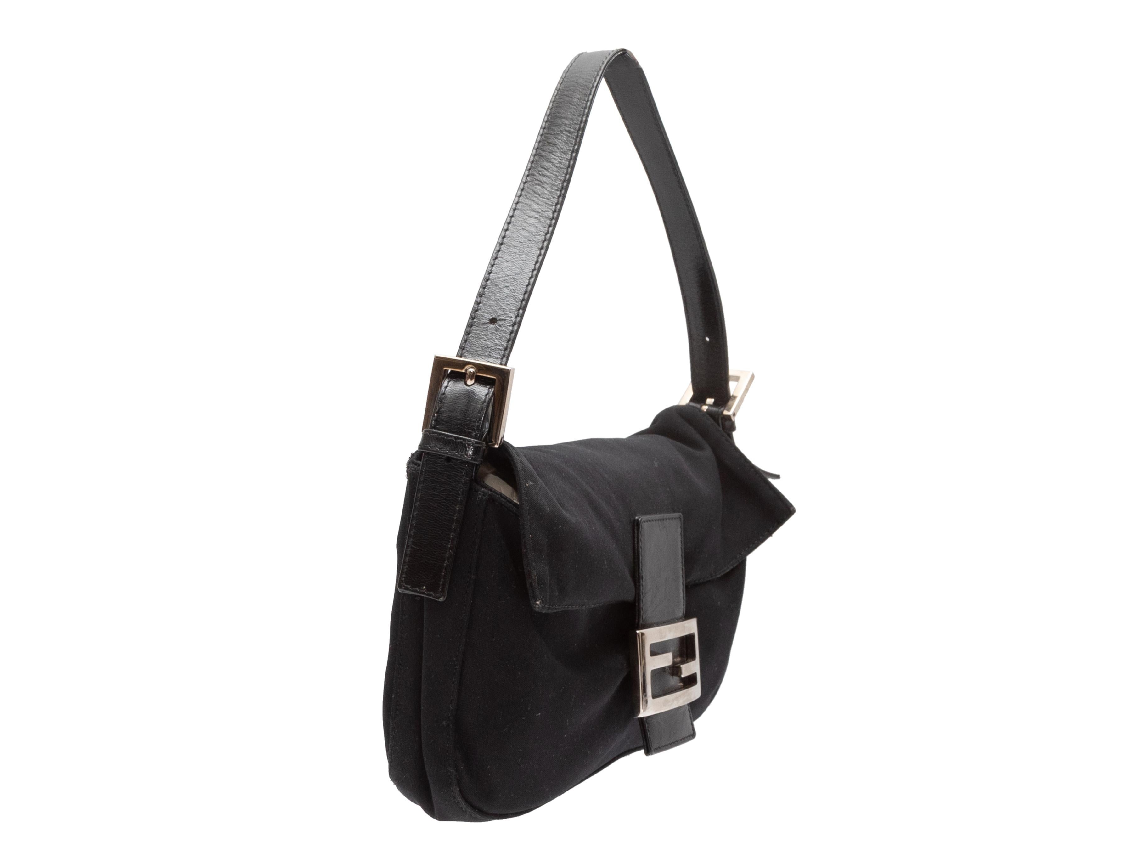 Black Fendi Neoprene & Leather Baguette Bag. This bag features a neoprene body, silver-tone hardware, leather trim, a single flat shoulder strap, and a front logo flap closure. 10.5